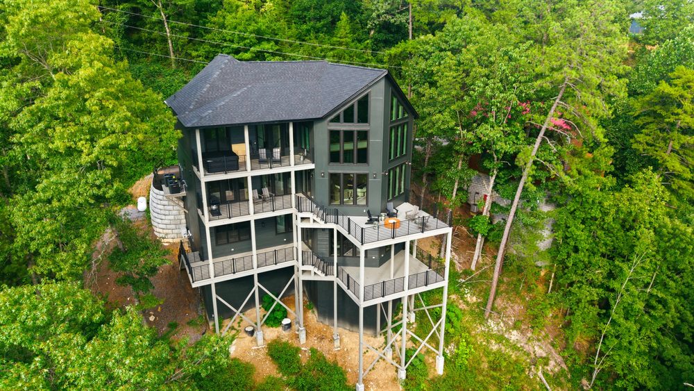 Aerial view of the home in the trees at 1813 Red Bone Way, Sevierville TN