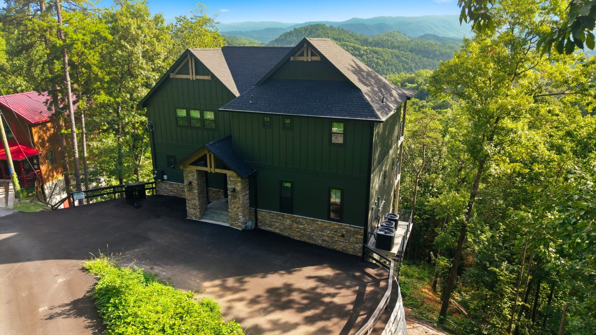 Aerial view of the home and mountain ridges at 1813 Red Bone Way, Sevierville TN