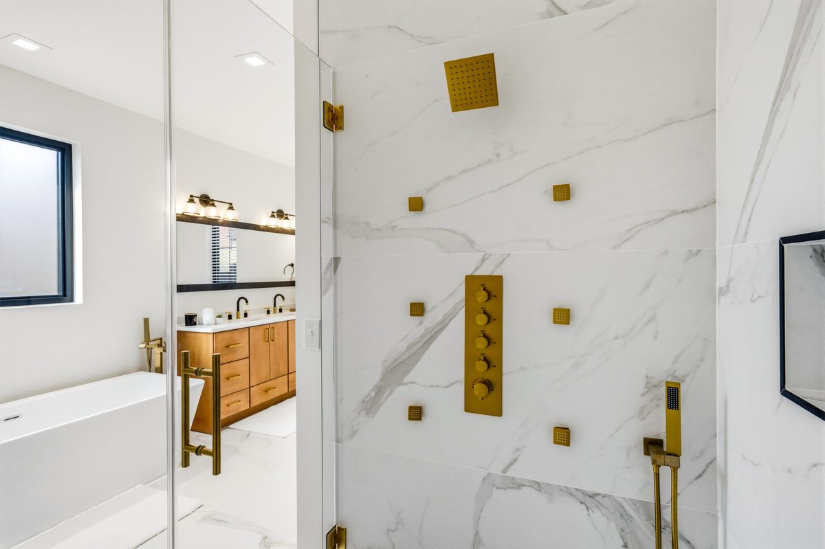 Bathroom with marble walk-in shower and freestanding tub at 550 Greenbriar Ln, Gatlinburg TN