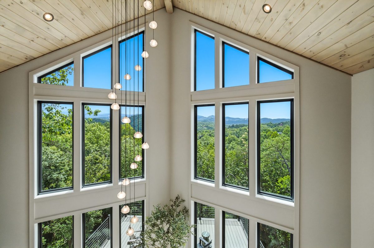 Two-story window wall with forest views at 1813 Red Bone Way, Sevierville TN