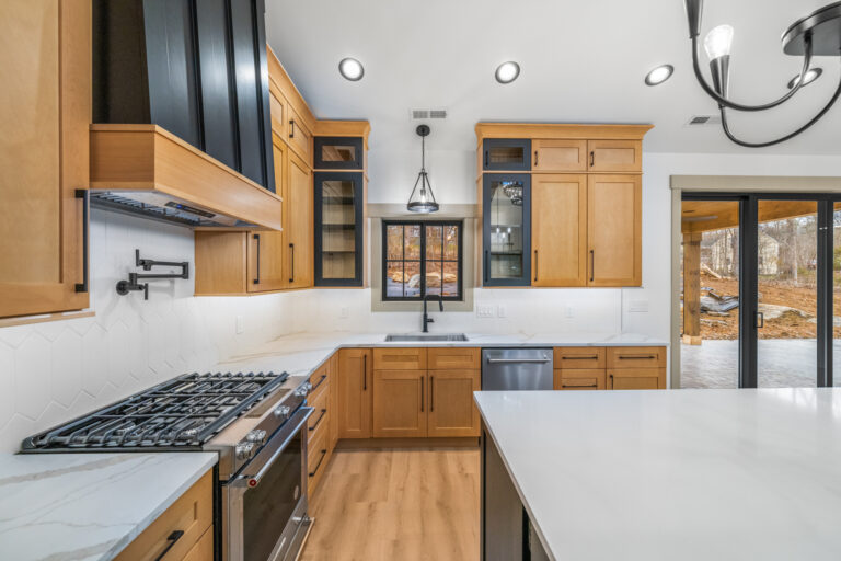 Kitchen with gas range and island at 266 Elohi Way, Loudon TN