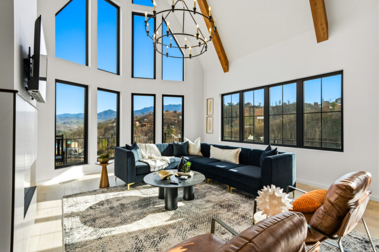 Living room with mountain view windows at 550 Greenbriar Ln, Gatlinburg TN